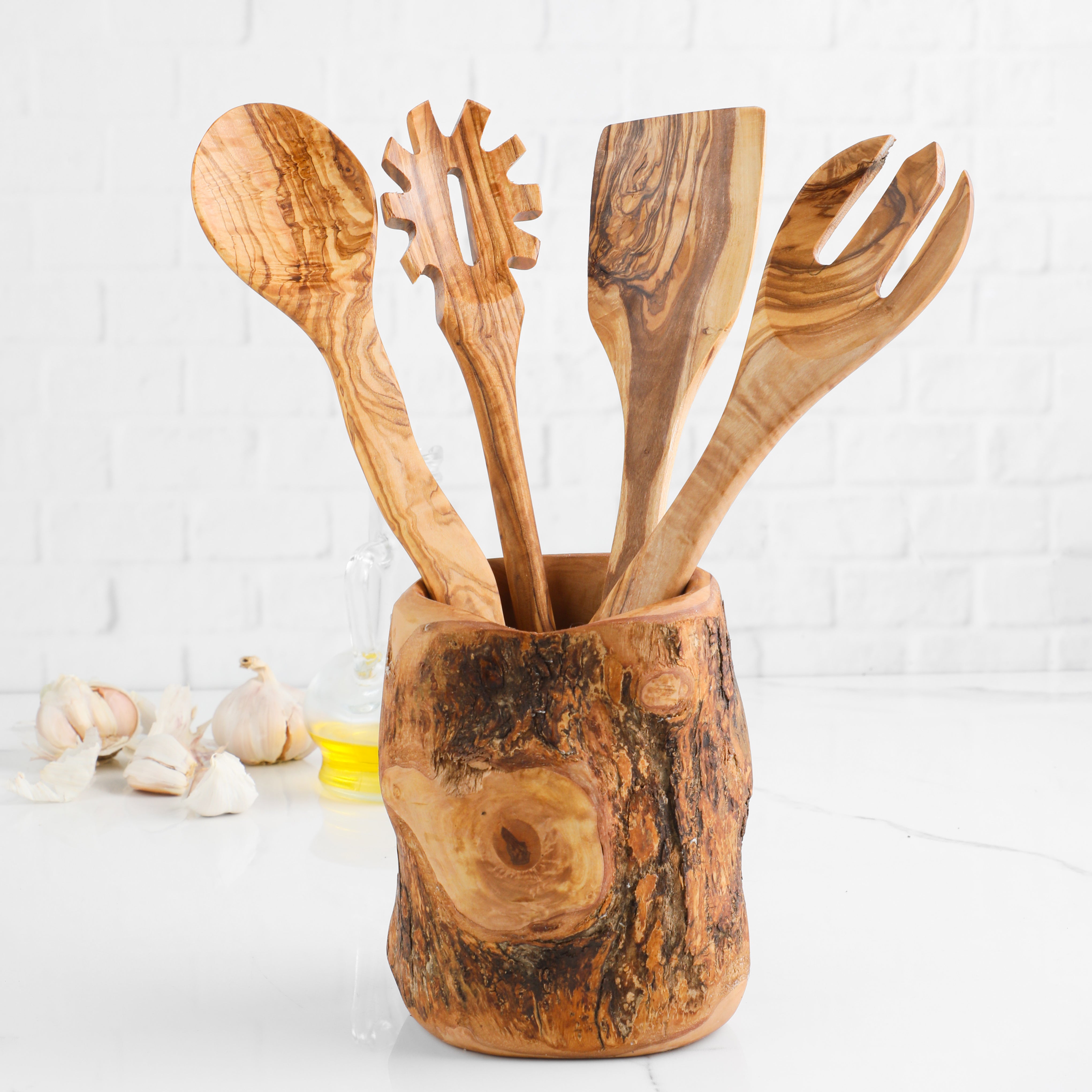 Olive wood utensil set with tree trunk holder and four cooking spoons